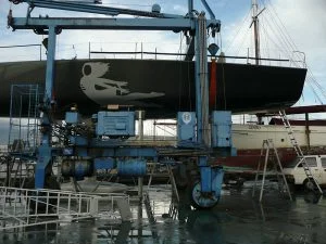 Boat with mermaid design on land hoist
